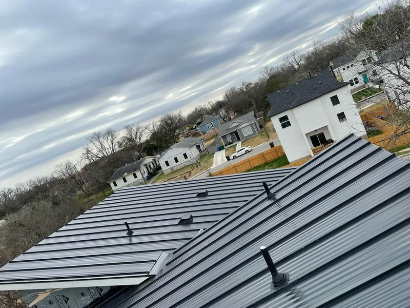 Standing seam metal roof panels with vents for Skylight Repair in Winchendon